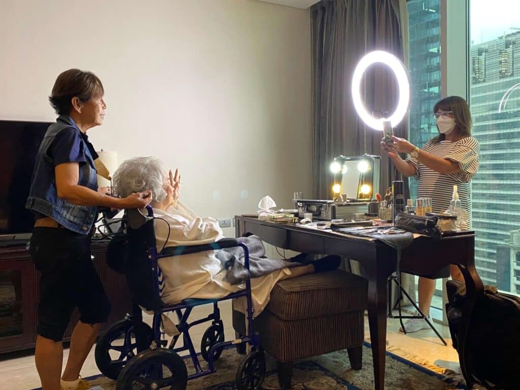 Tessie Agana doing hair and makeup prior to FAMAS 2022
